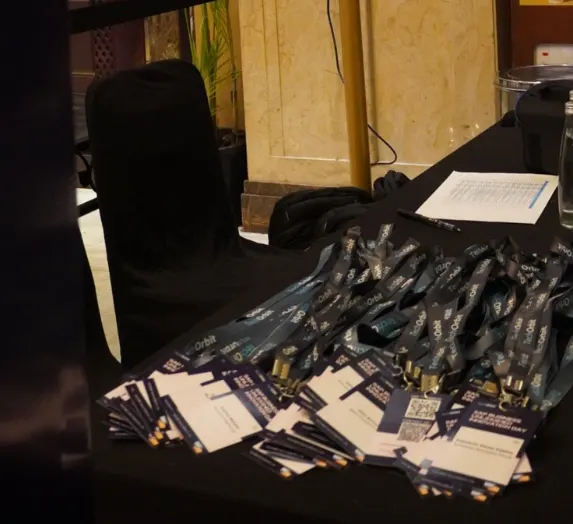 SAP Business Unleashed event registration materials including badges and kits for attendees in Pune